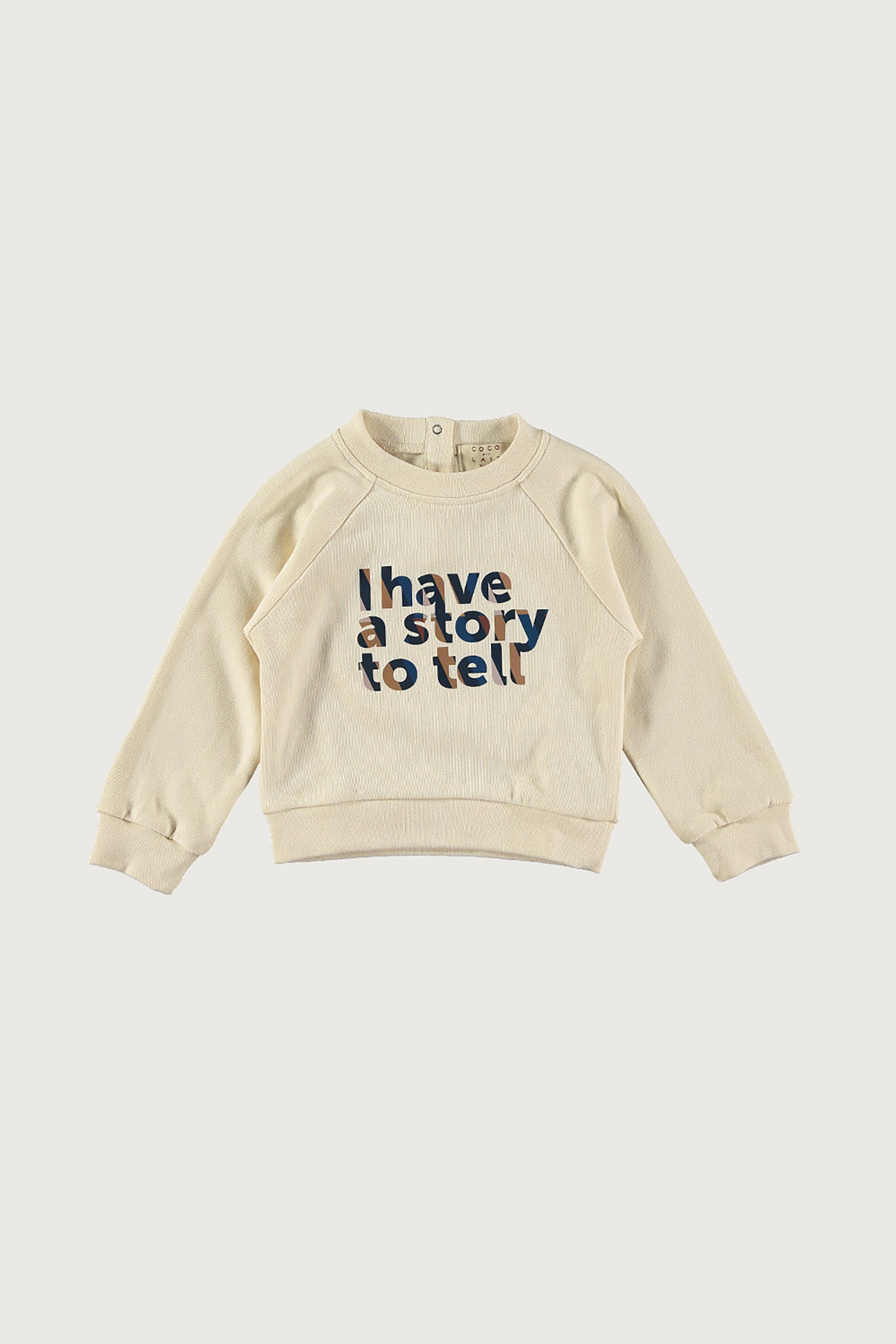 Coco Au Lait I HAVE A STORY TO TELL BABY SWEATSHIRT Parchment