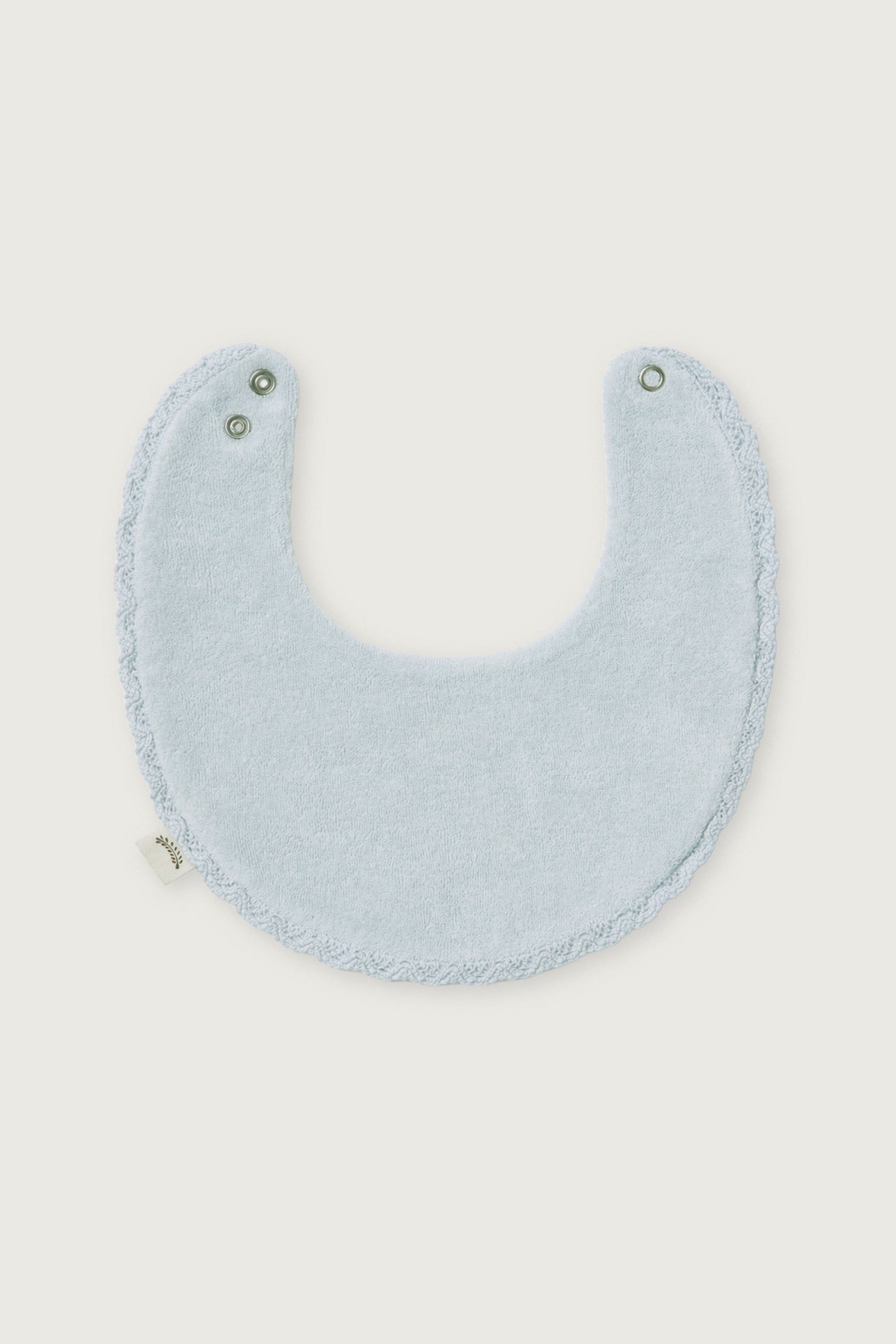 BABERO MUSELINA AZUL PERLA